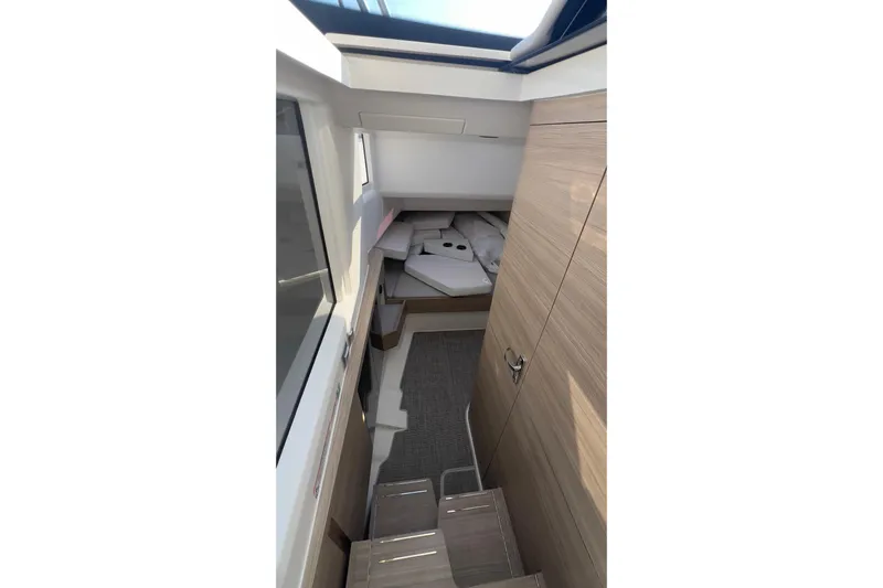  Yacht Photos Pics Interior view of 2025 Saxdor 400 GTC cabin with modern design and wooden finishes.
