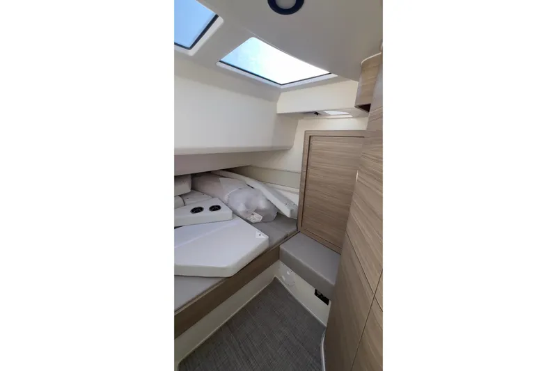  Yacht Photos Pics Interior cabin of 2025 Saxdor 400 GTC boat, featuring modern design and skylights.