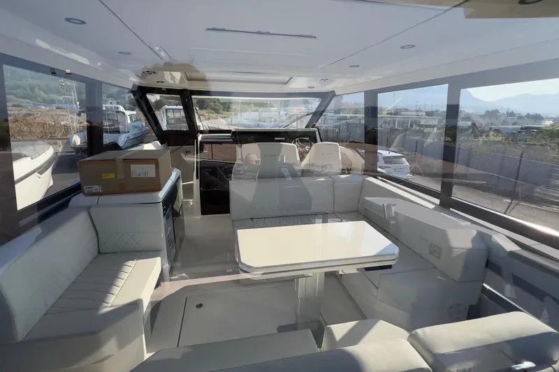  Yacht Photos Pics Interior of 2025 Saxdor 400 GTC boat with modern seating and panoramic windows.