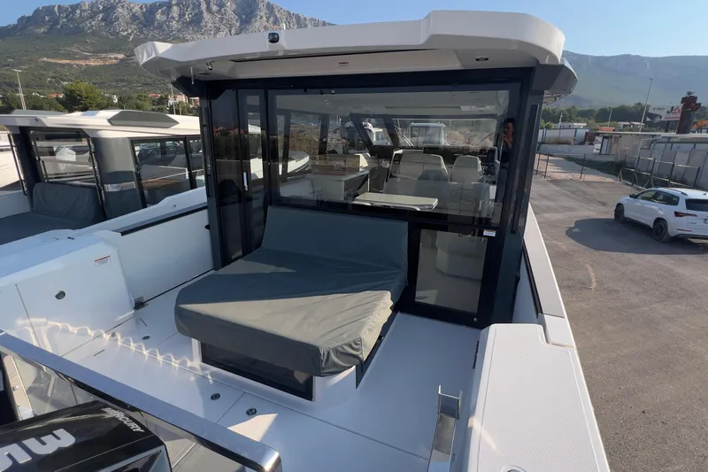  Yacht Photos Pics 2025 Saxdor 400 GTC boat with sleek design, spacious deck, and modern seating.