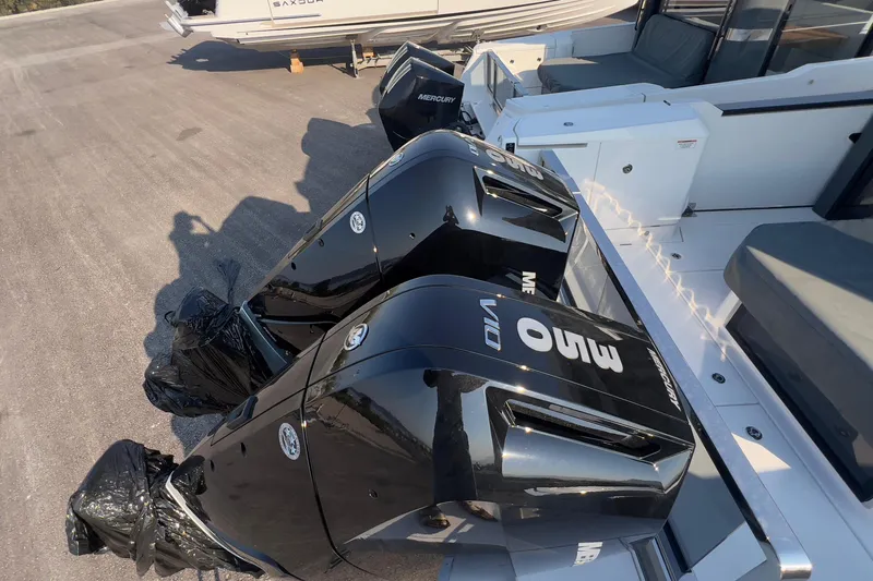 Yacht Photos Pics 2025 Saxdor 400 GTC with powerful Mercury V10 outboard engines, docked and ready.