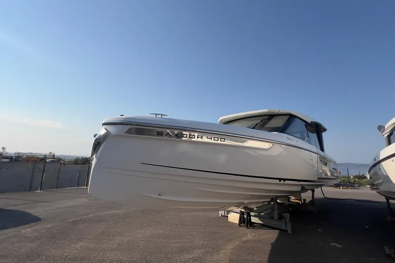  Yacht Photos Pics 2025 Saxdor 400 GTC boat displayed outdoors on a sunny day.