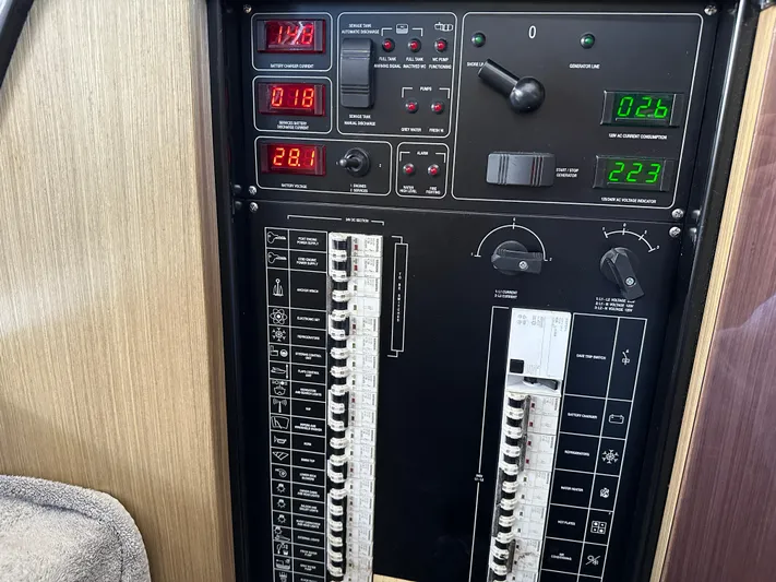  Yacht Photos Pics Electrical control panel of a 2005 Riva 52 Rivale yacht, featuring gauges and switches.