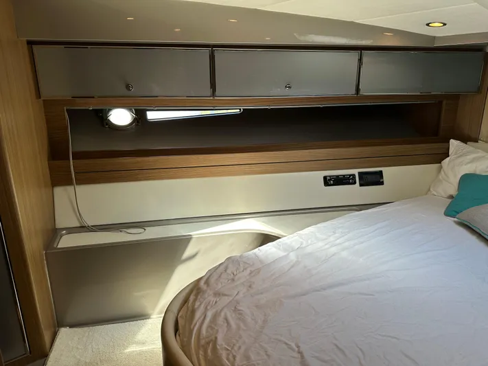  Yacht Photos Pics Interior cabin of 2005 Riva 52 Rivale yacht with modern storage and lighting.