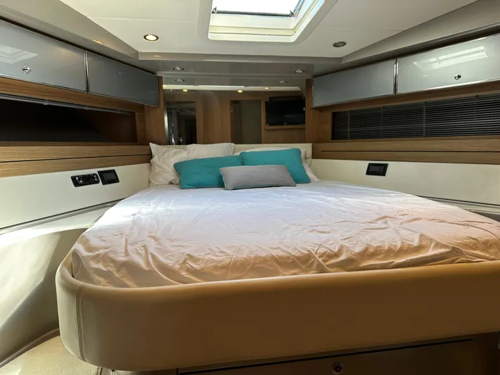  Yacht Photos Pics Luxurious bedroom interior of 2005 Riva 52 Rivale yacht with modern design.