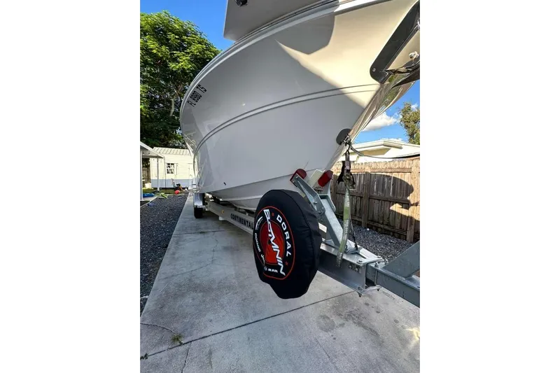  Yacht Photos Pics 2024 Sea Fox 268 Commander boat on trailer, parked in driveway.