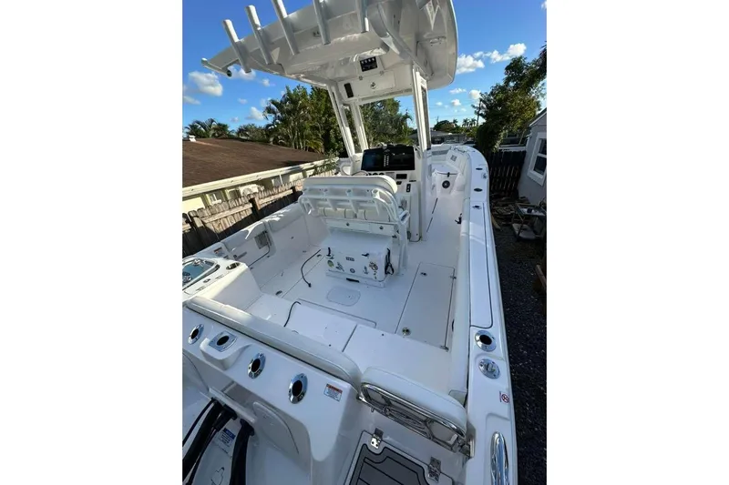  Yacht Photos Pics 2024 Sea Fox 268 Commander boat interior with helm, seating, and storage compartments.