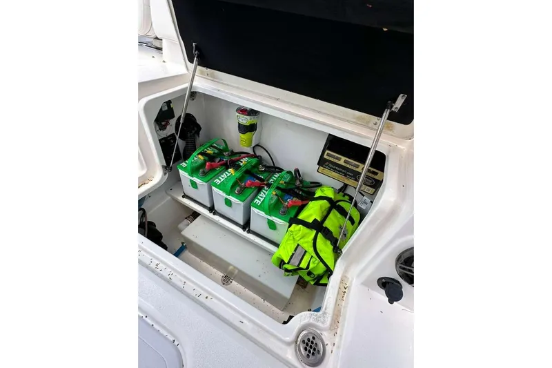  Yacht Photos Pics Open storage compartment in 2024 Sea Fox 268 Commander with batteries and safety gear.
