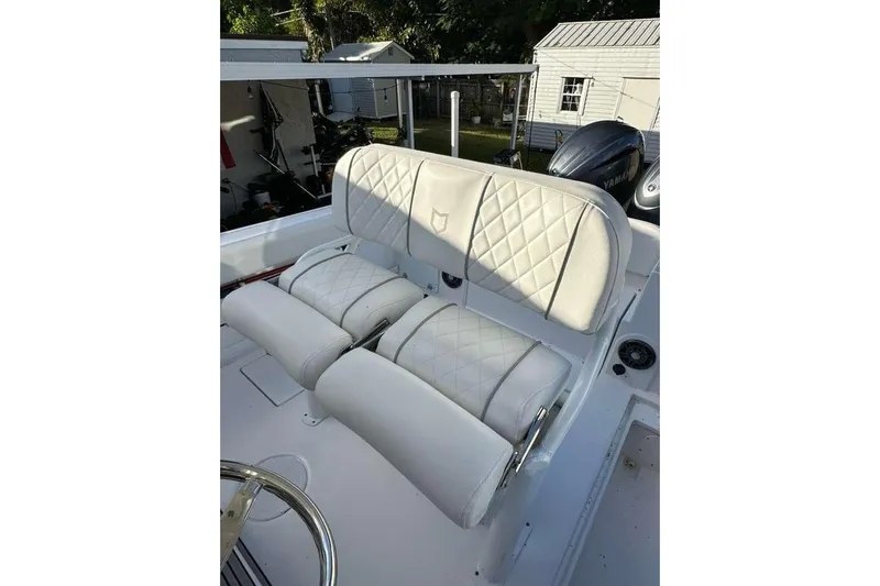  Yacht Photos Pics 2024 Sea Fox 268 Commander boat with white cushioned seating and Yamaha engine.