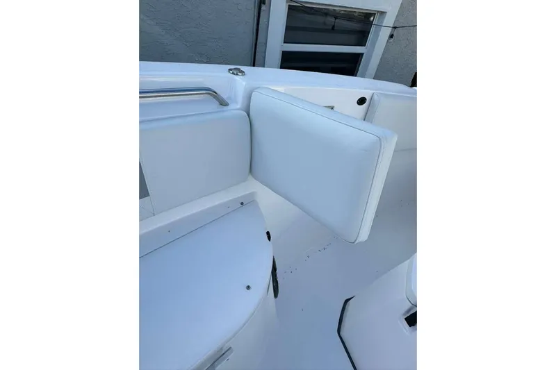  Yacht Photos Pics 2024 Sea Fox 268 Commander boat interior with white cushioned seating.