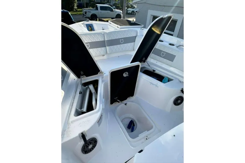  Yacht Photos Pics 2024 Sea Fox 268 Commander boat interior with open storage compartments.