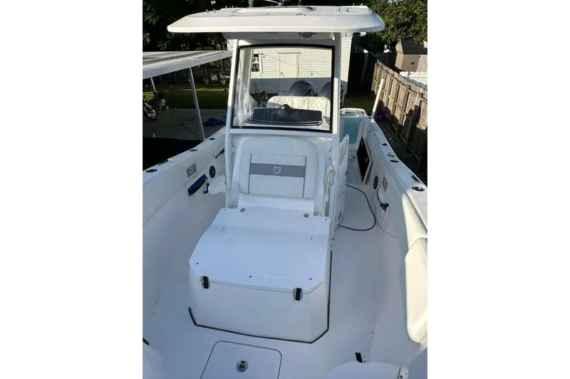  Yacht Photos Pics 2024 Sea Fox 268 Commander boat interior with seating and console.