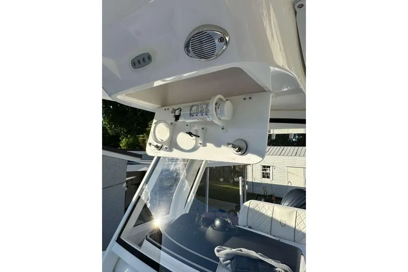  Yacht Photos Pics 2024 Sea Fox 268 Commander boat interior with speaker and storage compartment.