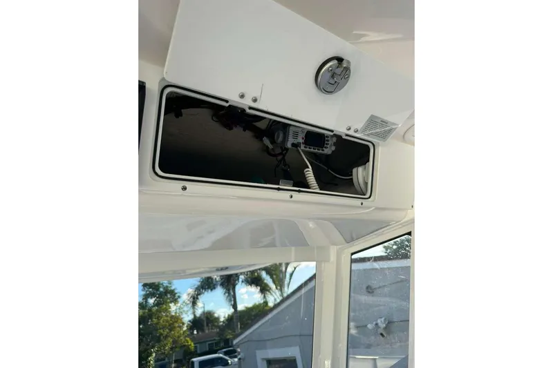  Yacht Photos Pics 2024 Sea Fox 268 Commander boat console with open storage compartment.