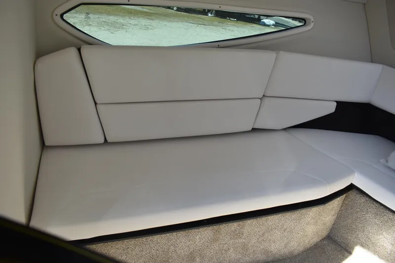  Yacht Photos Pics Interior cabin of 2026 Regal 26 XO boat with white cushioned seating.