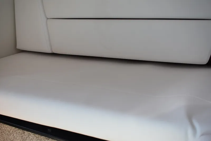  Yacht Photos Pics 2026 Regal 26 XO boat interior with white cushioned seating.