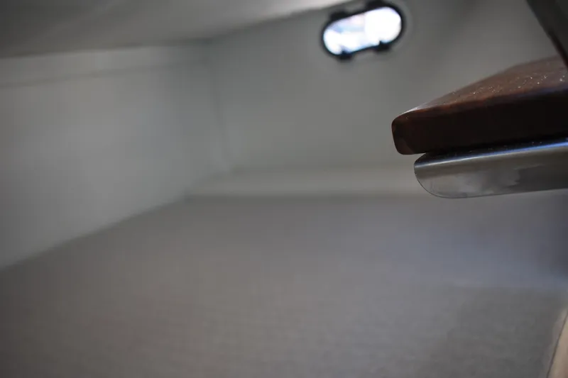  Yacht Photos Pics 2026 Regal 26 XO cabin interior with window and seating area.