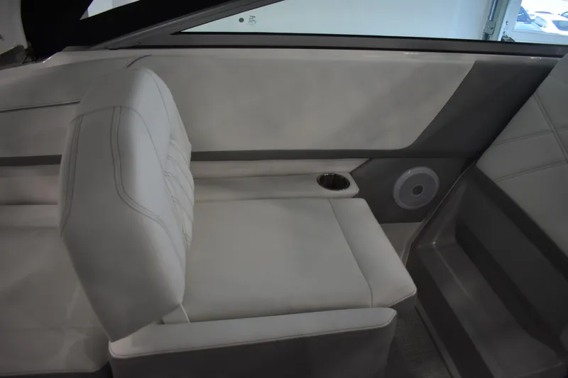  Yacht Photos Pics 2026 Regal 26 XO boat interior with white seating and built-in speaker.