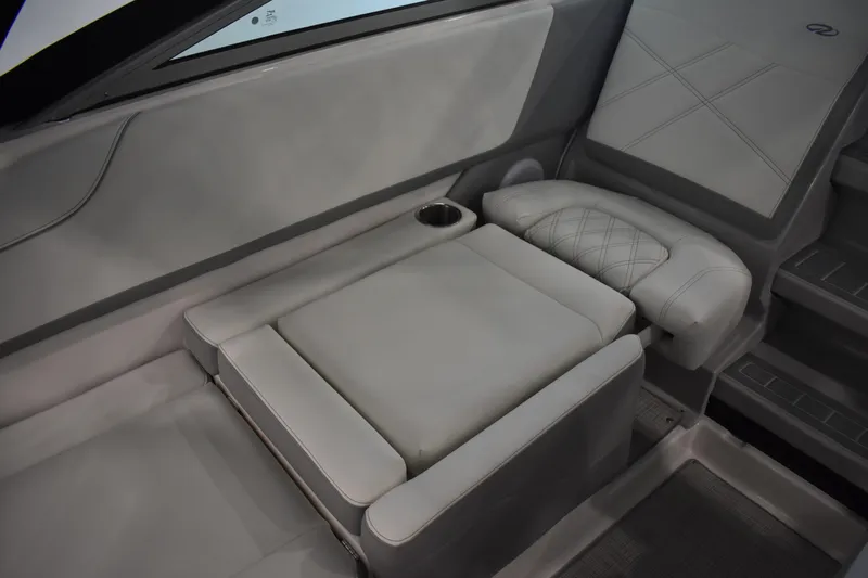  Yacht Photos Pics 2026 Regal 26 XO boat interior with luxurious seating and cup holder.