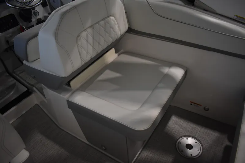  Yacht Photos Pics 2026 Regal 26 XO boat interior with cushioned seating and modern design.