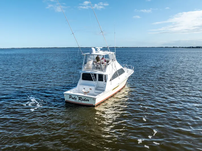  Yacht Photos Pics Ocean 57 yacht from 2006 on open water, clear sky background.