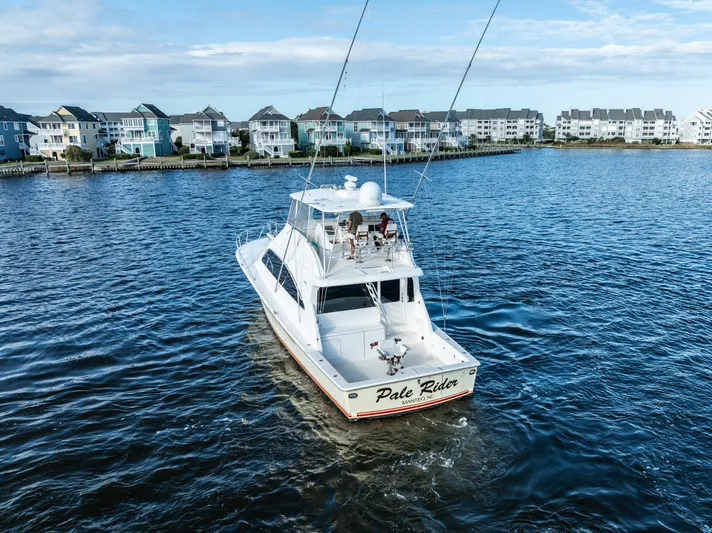  Yacht Photos Pics Luxury Ocean 57 yacht cruising near coastal homes, 2006 model.