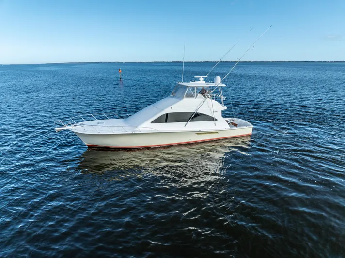  Yacht Photos Pics 2006 Ocean 57 yacht cruising on calm blue waters.