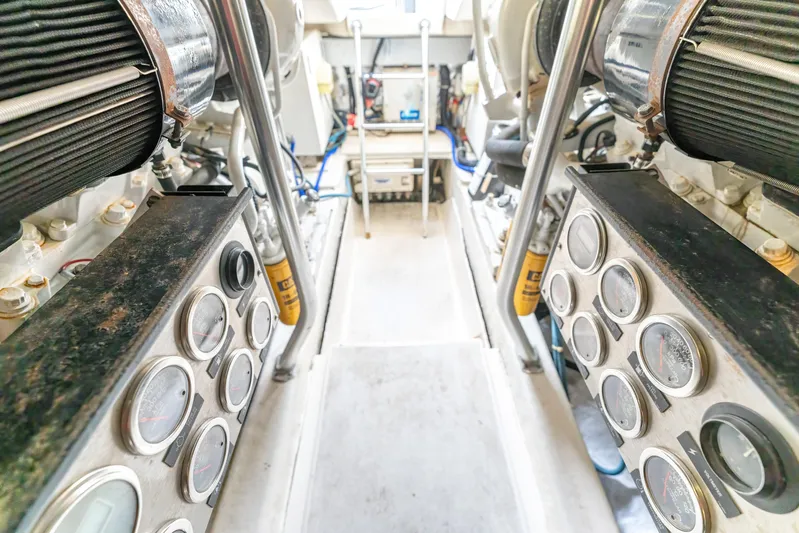  Yacht Photos Pics Engine room of 2006 Ocean 57 yacht, showcasing machinery and controls.