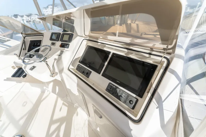  Yacht Photos Pics 2006 Ocean 57 yacht helm with advanced navigation systems and controls.