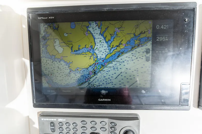  Yacht Photos Pics Garmin GPS display on 2006 Ocean 57 yacht, showing nautical map and navigation controls.