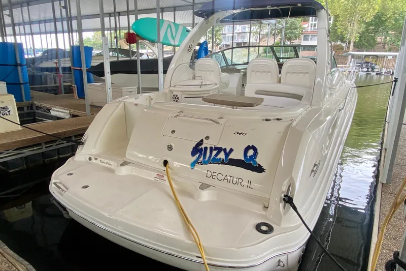  Yacht Photos Pics 2007 Sea Ray 340 Sundancer docked, rear view with "Suzy Q" name visible.