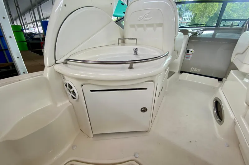  Yacht Photos Pics 2007 Sea Ray 340 Sundancer boat interior with sink and storage area.