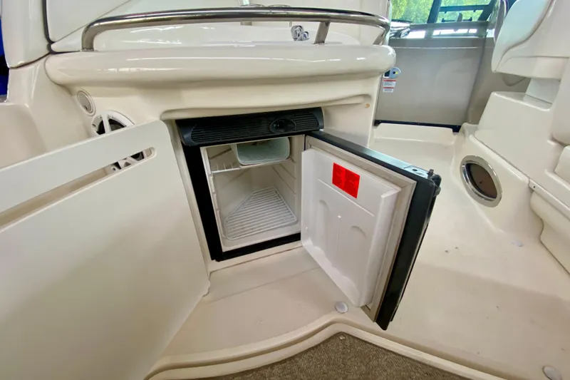  Yacht Photos Pics Open mini fridge on 2007 Sea Ray 340 Sundancer boat interior.