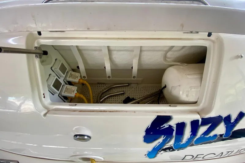  Yacht Photos Pics 2007 Sea Ray 340 Sundancer storage compartment with equipment and wiring.