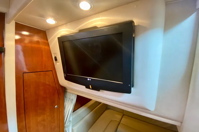  Yacht Photos Pics Interior of 2007 Sea Ray 340 Sundancer with wall-mounted LG TV.