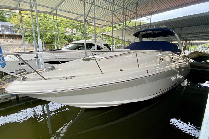  Yacht Photos Pics 2007 Sea Ray 340 Sundancer yacht docked in a covered marina.