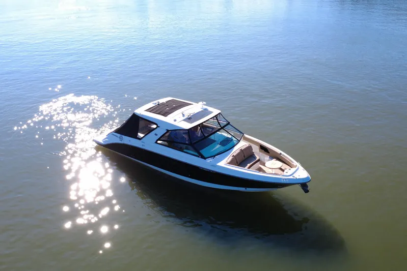  Yacht Photos Pics 2022 Sea Ray SLX 400 boat cruising on calm water under sunlight.