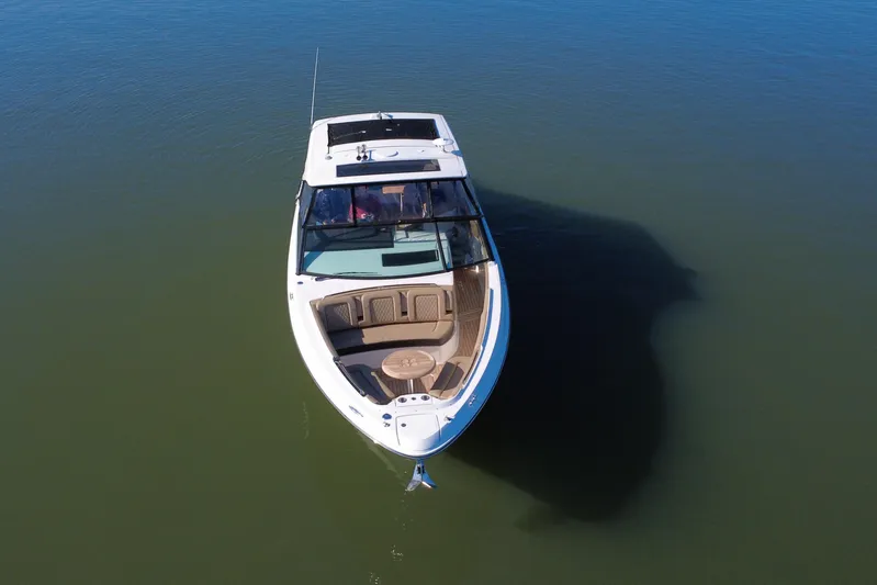  Yacht Photos Pics 2022 Sea Ray SLX 400 boat on calm water, aerial view.