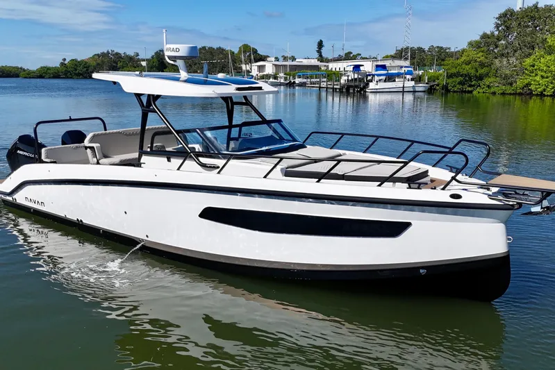  Yacht Photos Pics 2026 Navan S30 boat on calm water, featuring sleek design and modern amenities.