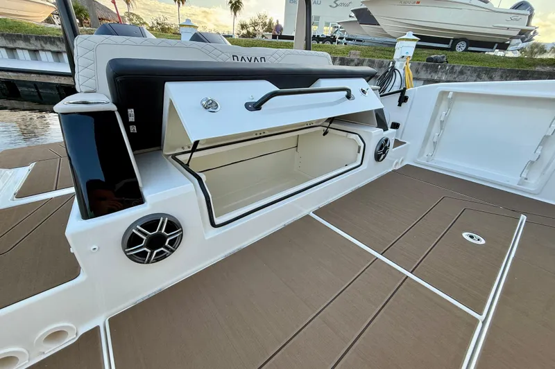  Yacht Photos Pics 2026 Navan S30 boat with open storage compartment and sleek deck design.