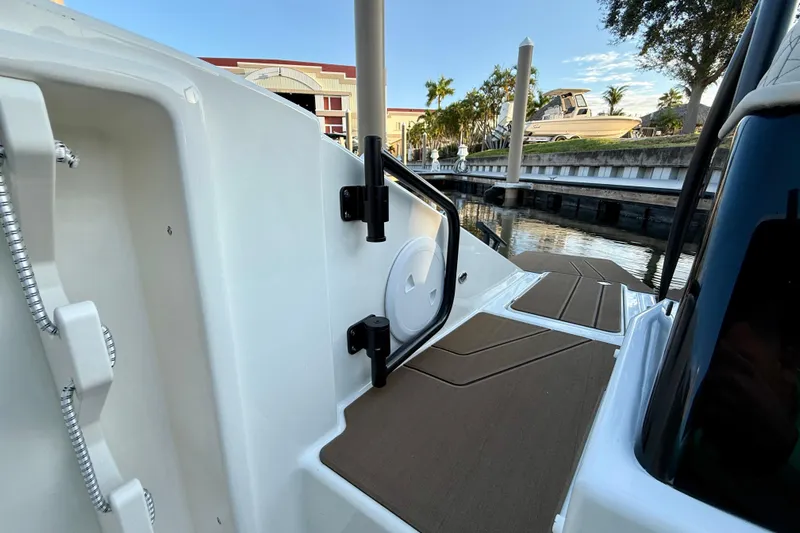  Yacht Photos Pics 2026 Navan S30 boat docked, showcasing deck and water view.