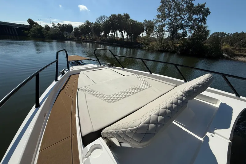  Yacht Photos Pics Navan S30 2026 boat with luxurious seating on a serene lake.