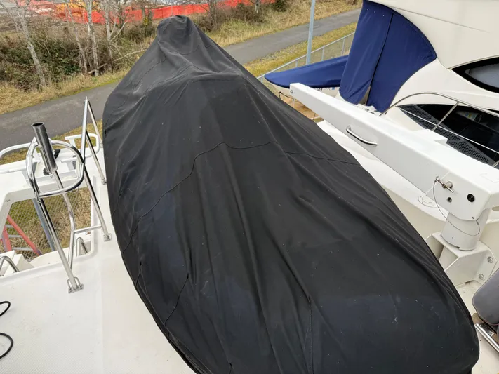  Yacht Photos Pics Covered boat on a 2003 Meridian 490 Pilothouse deck.