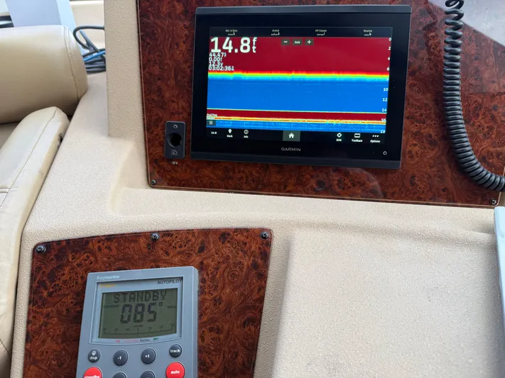  Yacht Photos Pics Control panel of 2003 Meridian 490 Pilothouse with navigation and depth display.