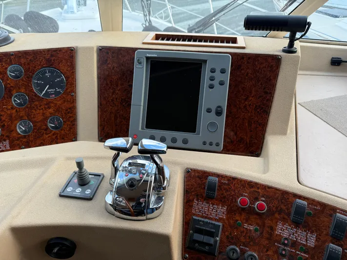  Yacht Photos Pics Control panel of a 2003 Meridian 490 Pilothouse yacht with navigation equipment.