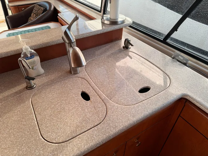  Yacht Photos Pics Kitchen sink area in a 2003 Meridian 490 Pilothouse yacht.