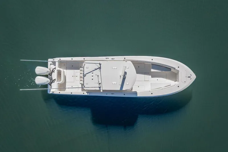 Yacht Photos Pics Aerial view of 2013 Invincible 36 boat on calm water.