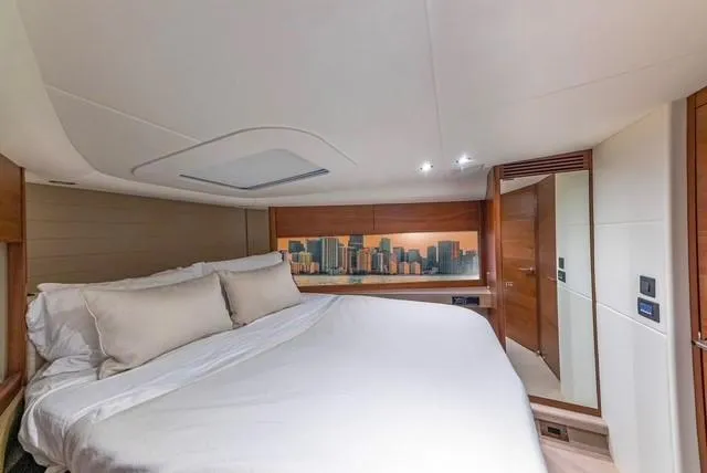 Presumed Innocent Yacht Photos Pics Luxurious bedroom interior of 2017 Princess V48 Open yacht with modern decor.