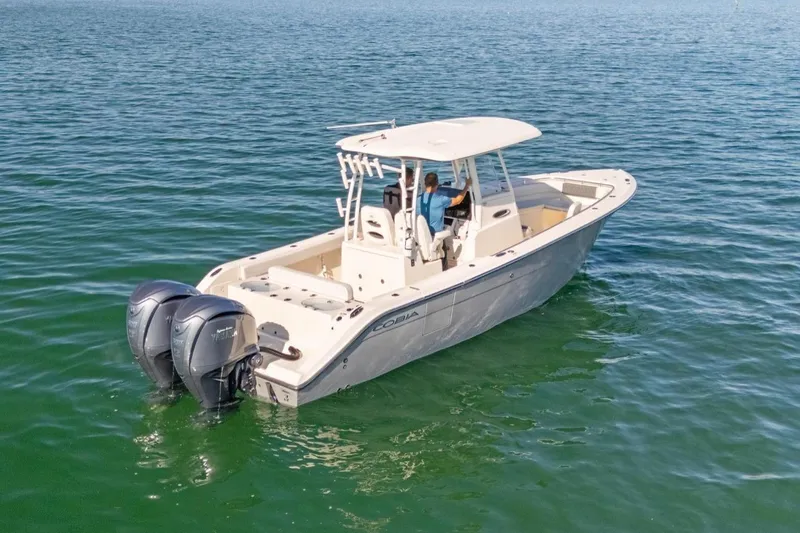  Yacht Photos Pics 2023 Cobia 301 Center Console on open water.
