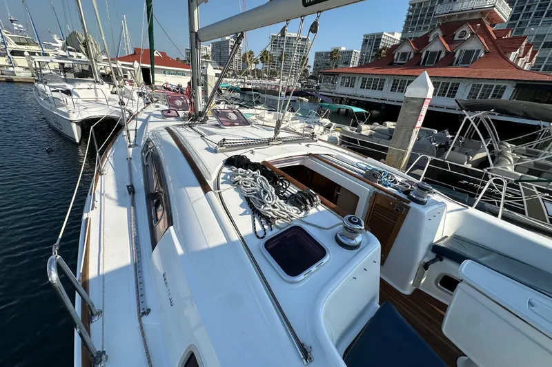 Shamrock Yacht Photos Pics 2011 Beneteau Oceanis 40 sailboat docked at marina, showcasing deck and rigging.